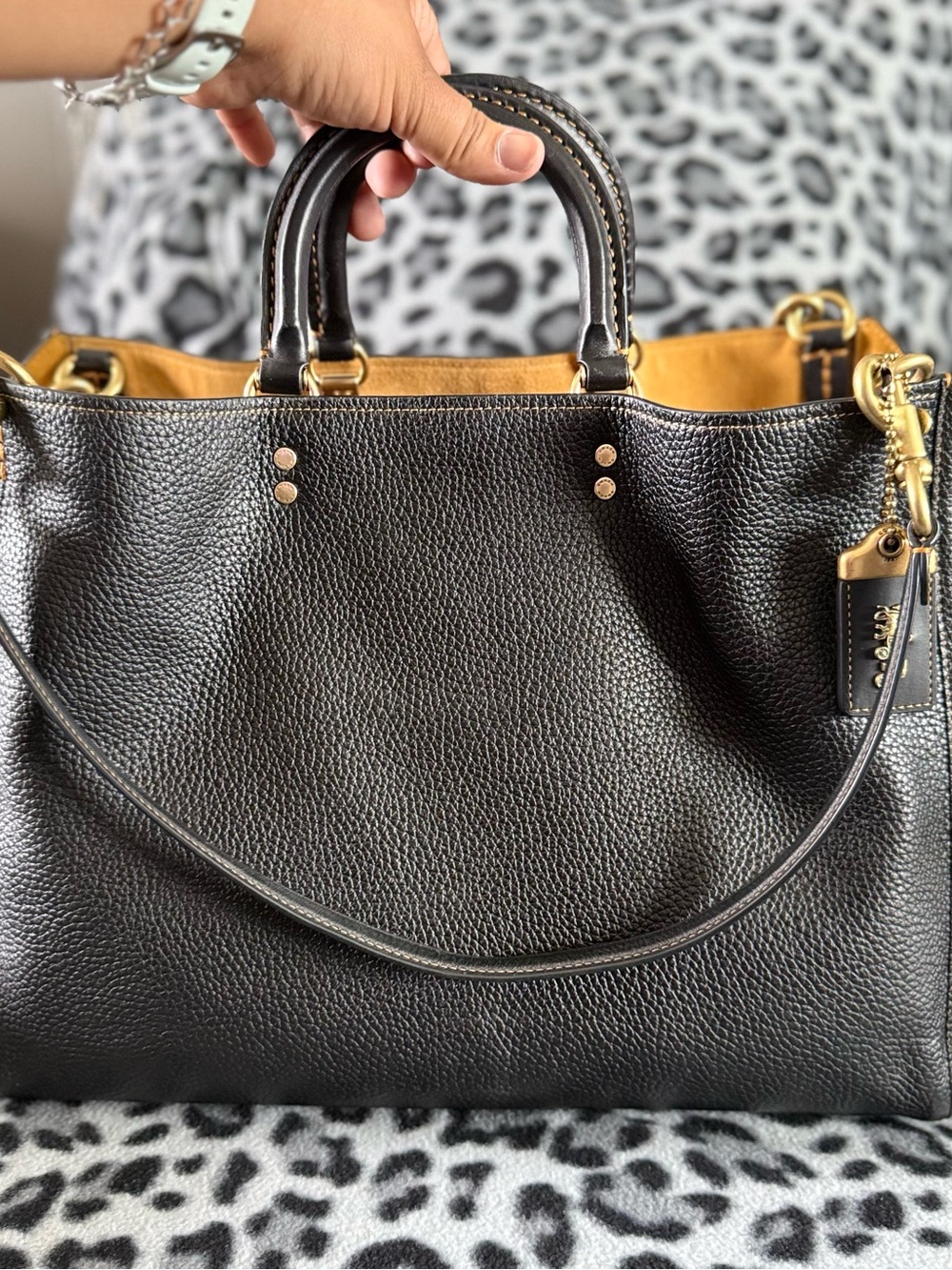Coach Rogue 39 in black pebbled leather and brass hardware